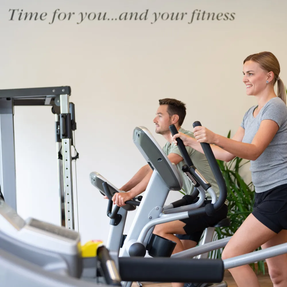Gym at the Wellness Hotel Alpenflora with modern fitness equipment